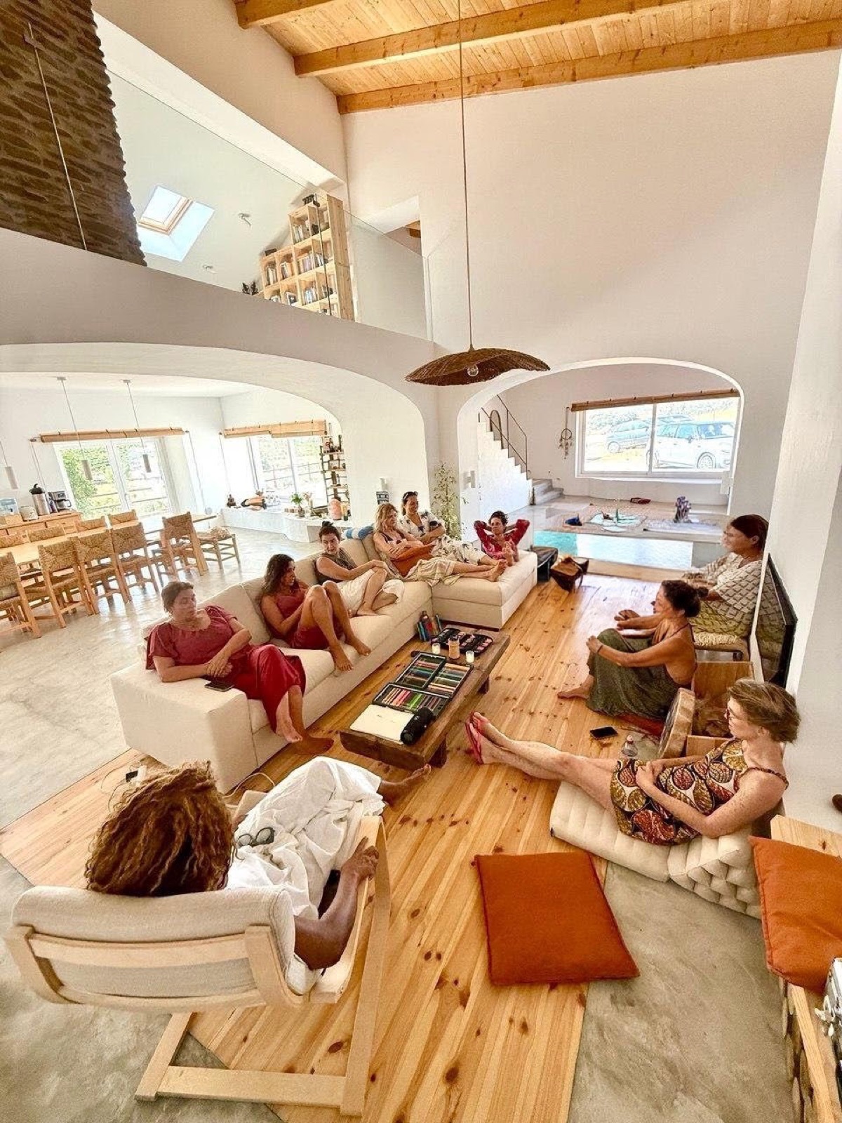 Women gathered in the light-filled living room